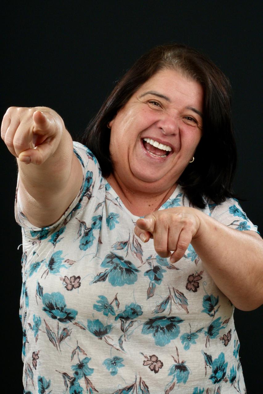 Paciente sorrindo no consultório
